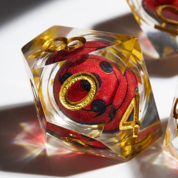 Crimson Arcane Eye dice set, deep red core in clear resin