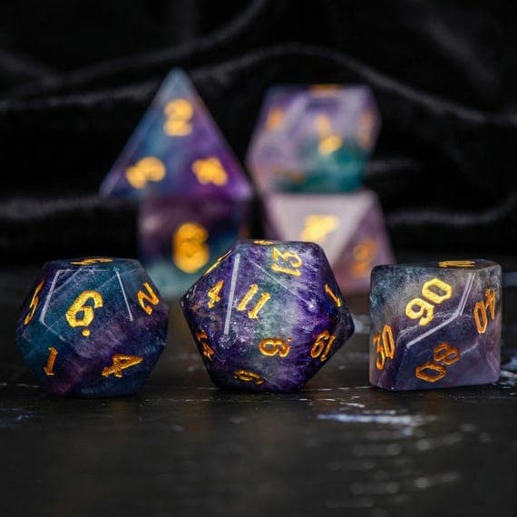 Celestial Veil stone dice set, violet and teal nebula swirls