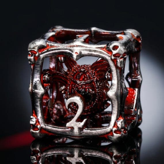 The Beholder hollow metal dice set, skeletal cage with elder eye